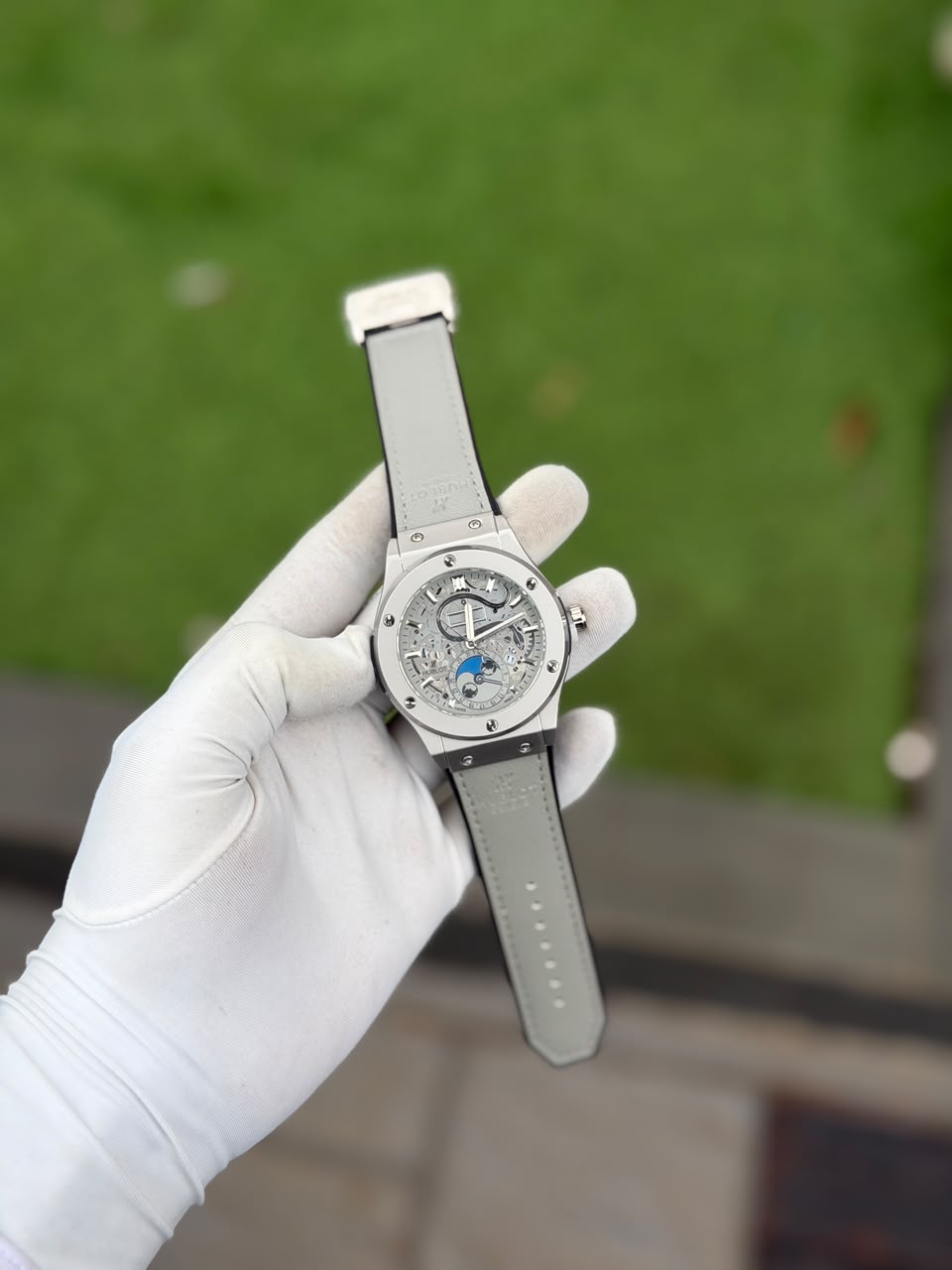Men's Luxury Skeleton Style Watch with Moon Phase Dial – Silver Case & Light Gray Strap
